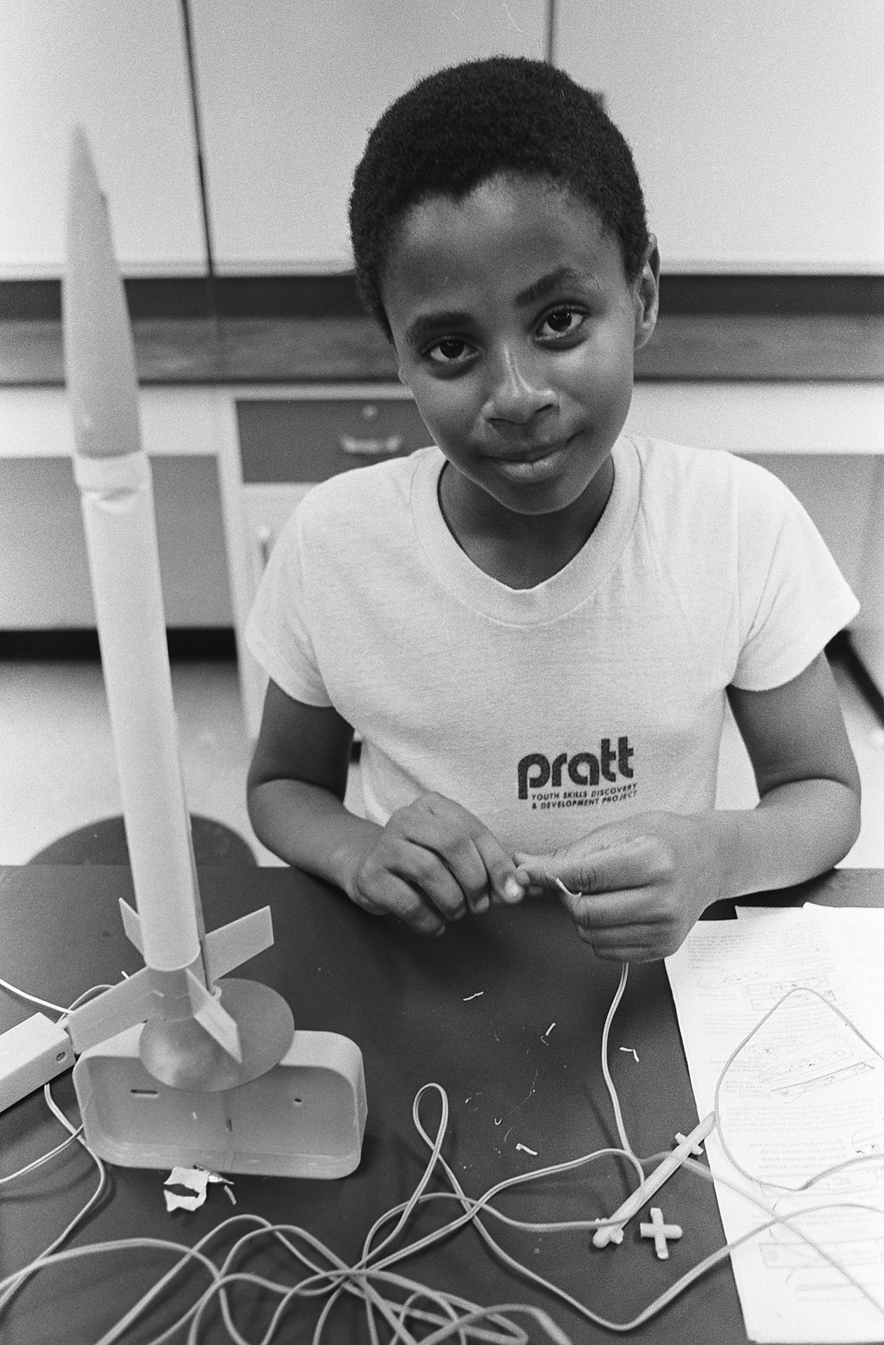student next to rocket