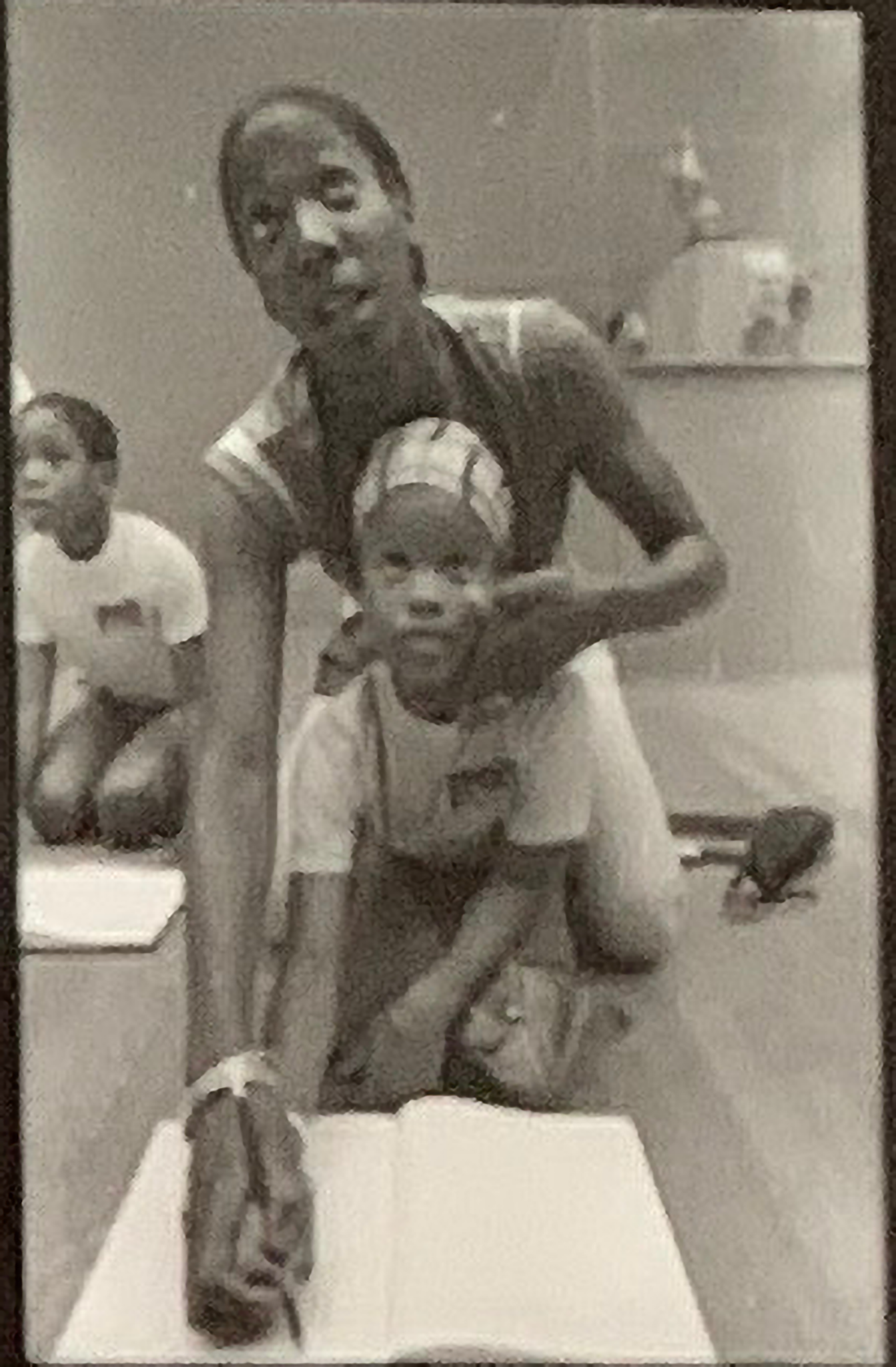 A counselor helping a student sketch at the Metropolitan Museum of Art