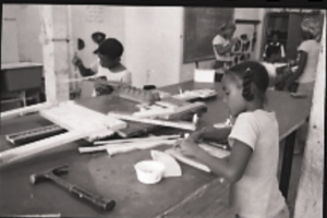 child working on arts and crafts