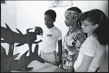 students looking at art in the Studio Museum of Harlem