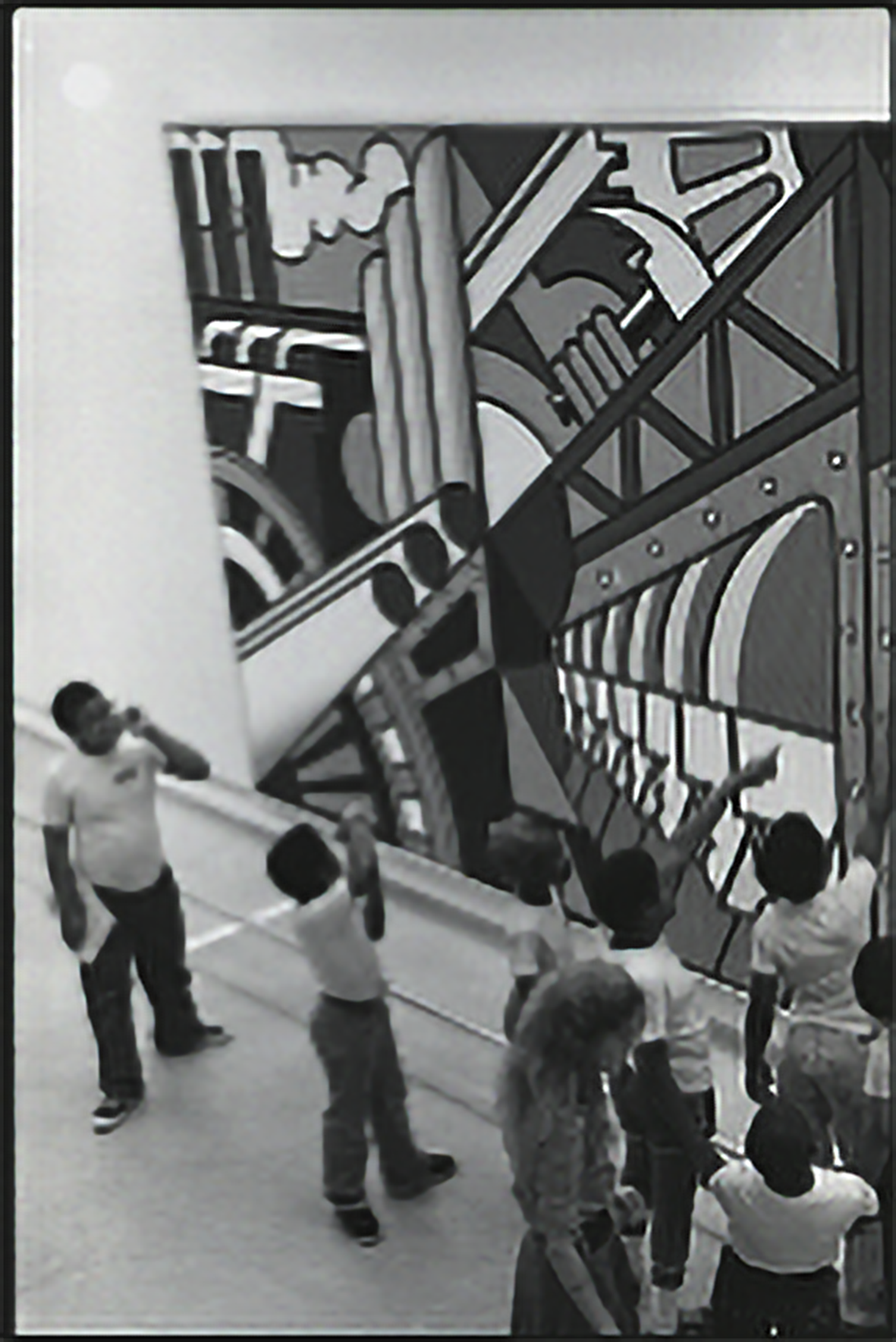 Students looking at a painting inside the Guggenheim