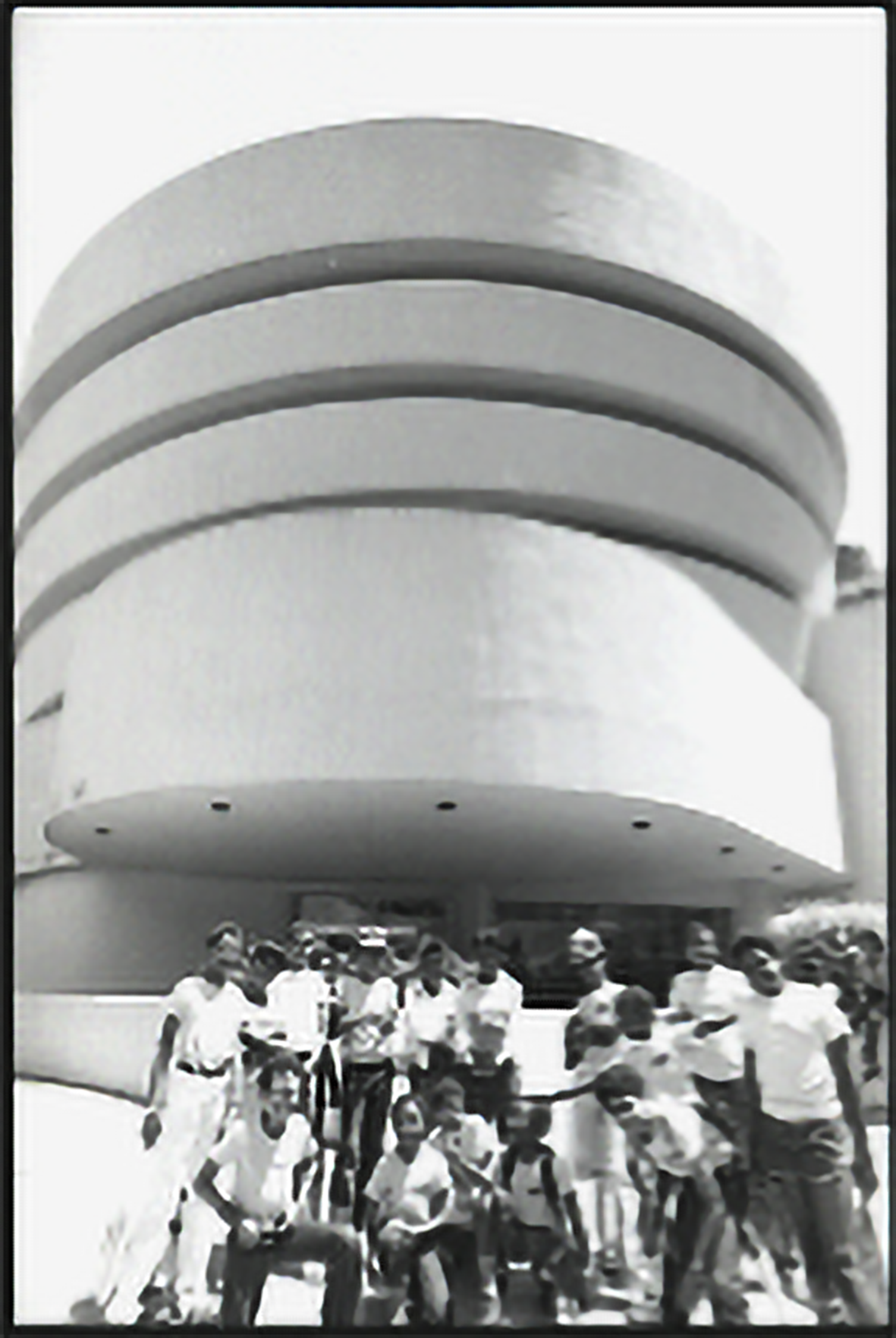 A group of students posing for a photograph outside the Guggenheim